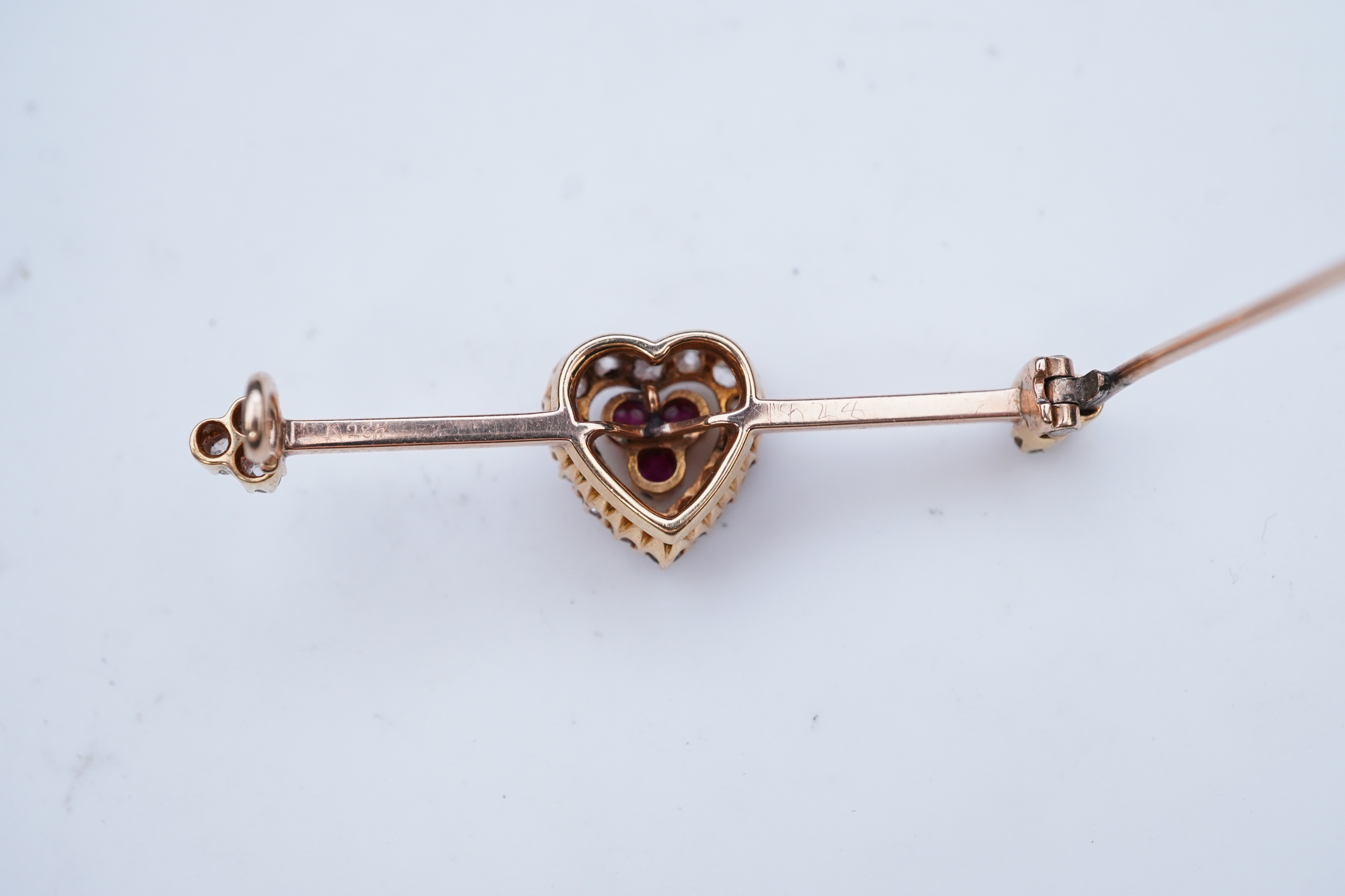 An Edwardian ruby and diamond brooch